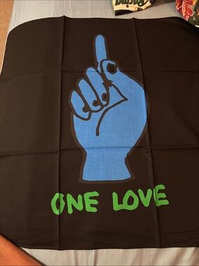 Sacai Black Poster with Blue Hand and Green Text